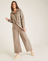 Dusty Pink: Flared Leg Long Sleeve Jumpsuit | Taupe